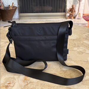 NWOT Tracker Anti Theft RFID Black Nylon Crossbody Bag Unisex